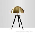 Three-legged golden dome modern popular table lamp